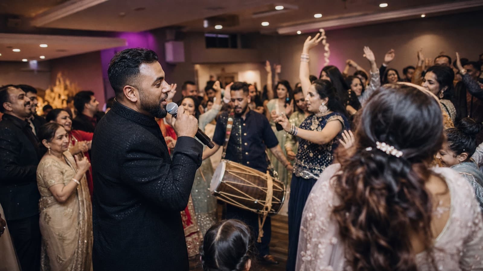 Behind the Scenes: I MCed a Sangeet in Harris Park. The Dhol, the Aunties and a 90-Second Rule Taught Me What 'Hype' Actually Means.