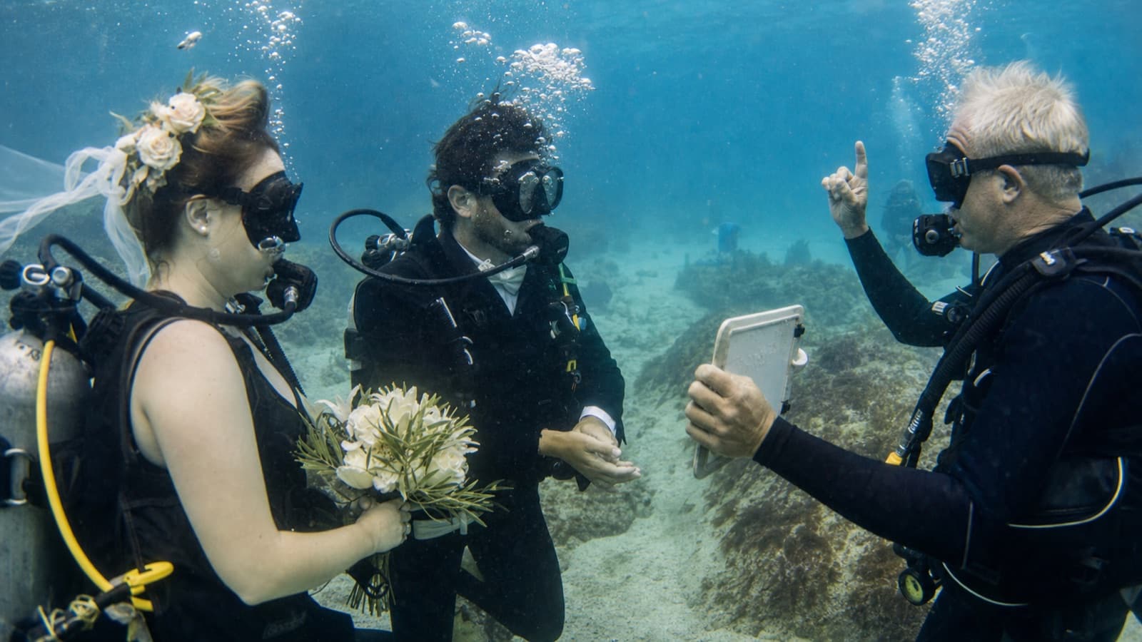 Underwater Weddings: How Do You MC When No One Can Hear You?