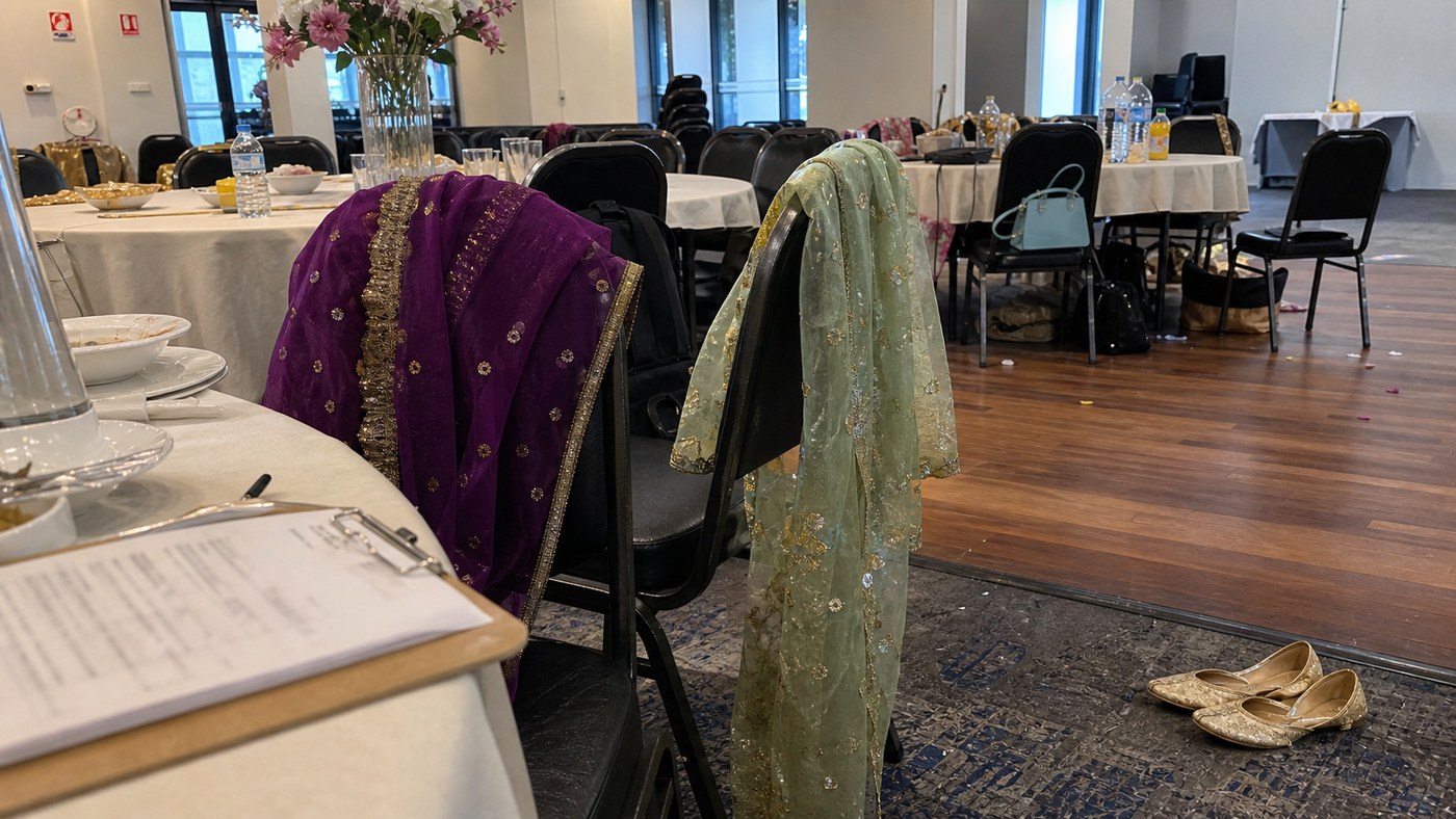 Banquet chairs and dance-floor details before a sangeet program begins